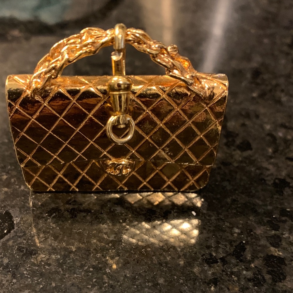 Gold rare Chanel bag or belt charm. Worn Used Vintage